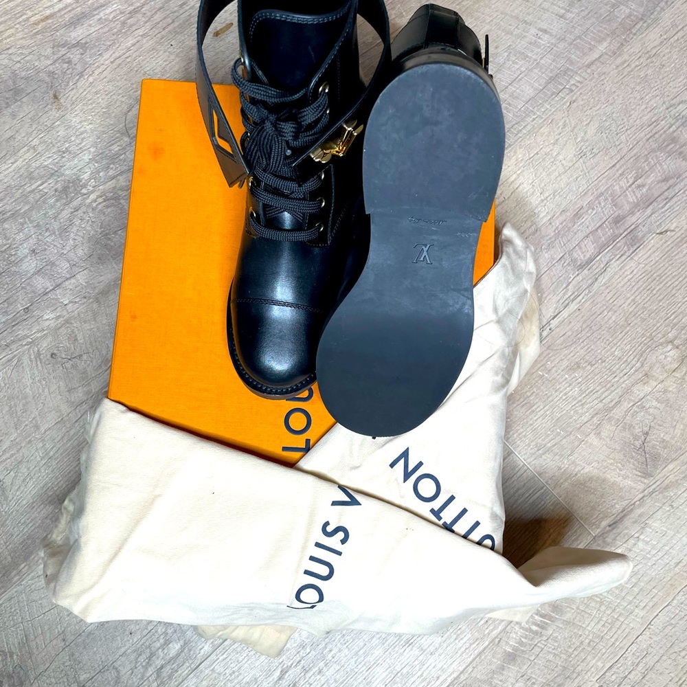 Black Louis Vuitton Wonderland flat ranger boot.